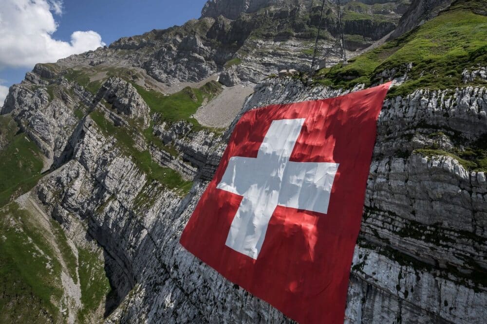 A foggy track field with visible lane numbers and white lines.